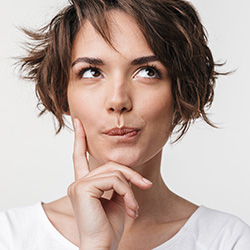 Beautiful young pretty thinking thoughtful woman