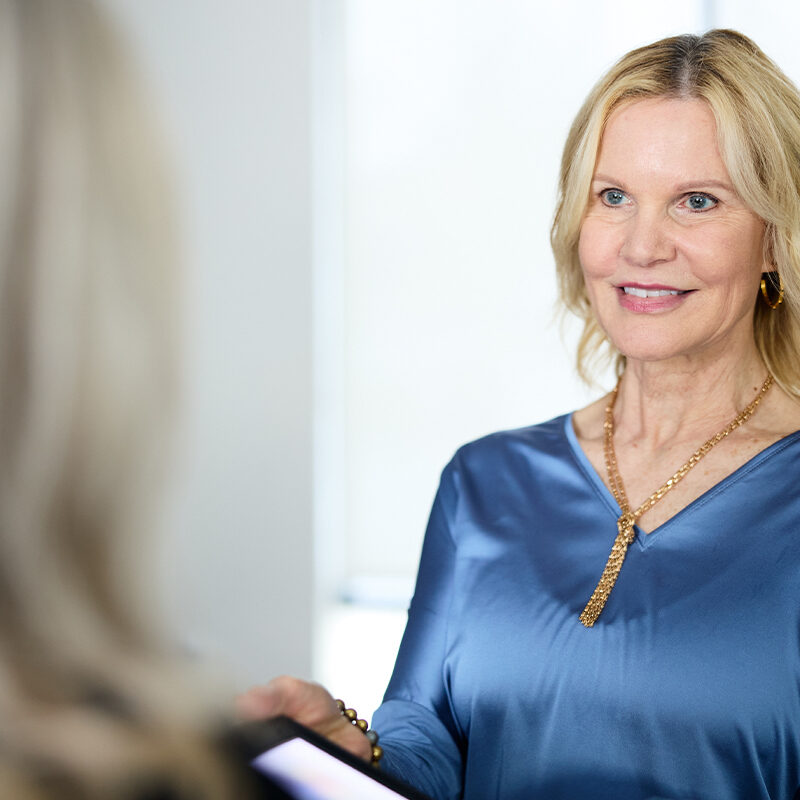 Woman getting a consultation for laser treatment options in Atlanta