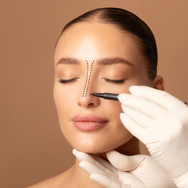 woman getting consulted for a rhinoplasty in Marietta, GA