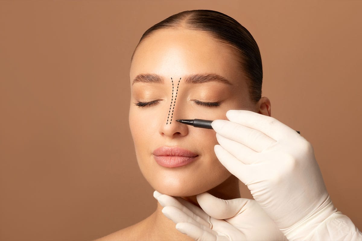 woman getting consulted for a rhinoplasty in Marietta, GA