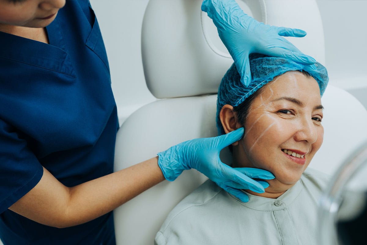 woman during her consultation for facial fat grafting in Marietta, GA